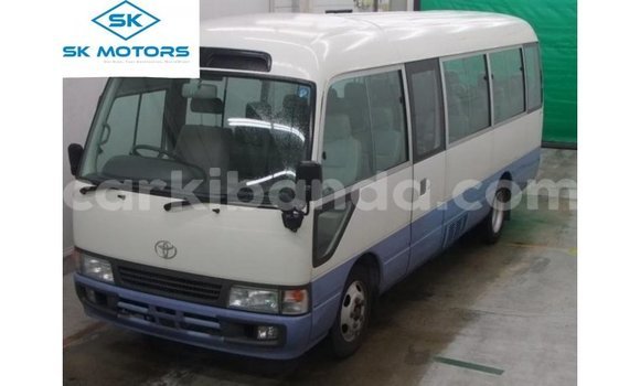 Acheter Import Voiture Toyota Coaster Blanc à Import - Dubai, Ouganda Acheter Import Voiture Toyota Coaster Blanc à Import - Dubai, Ouganda
