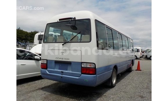 Acheter Import Voiture Toyota Coaster Blanc à Import - Dubai, Ouganda Acheter Import Voiture Toyota Coaster Blanc à Import - Dubai, Ouganda