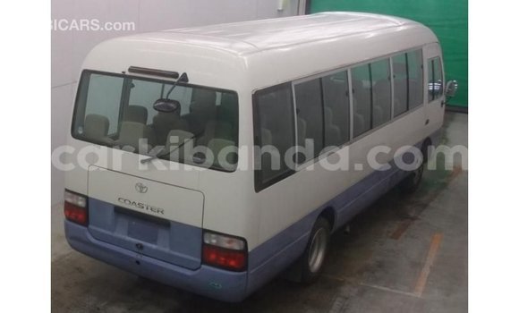 Acheter Import Voiture Toyota Coaster Blanc à Import - Dubai, Ouganda Acheter Import Voiture Toyota Coaster Blanc à Import - Dubai, Ouganda