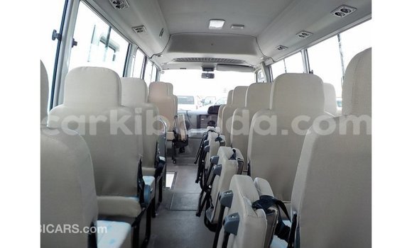 Acheter Import Voiture Toyota Coaster Blanc à Import - Dubai, Ouganda Acheter Import Voiture Toyota Coaster Blanc à Import - Dubai, Ouganda