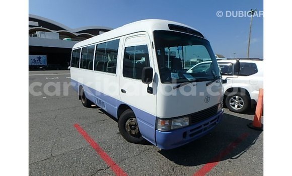 Acheter Import Voiture Toyota Coaster Blanc à Import - Dubai, Ouganda Acheter Import Voiture Toyota Coaster Blanc à Import - Dubai, Ouganda