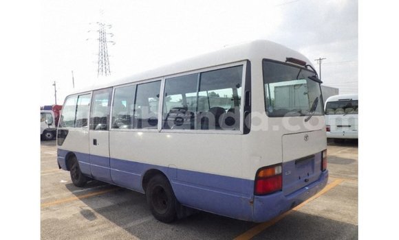 Acheter Import Voiture Toyota Coaster Blanc à Import - Dubai, Ouganda Acheter Import Voiture Toyota Coaster Blanc à Import - Dubai, Ouganda
