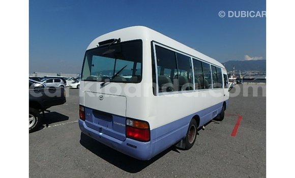Acheter Import Voiture Toyota Coaster Blanc à Import - Dubai, Ouganda Acheter Import Voiture Toyota Coaster Blanc à Import - Dubai, Ouganda