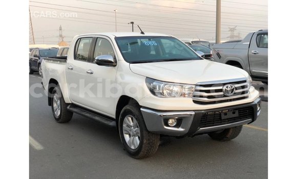 Buy Import Toyota Hilux White Car in Import - Dubai in Uganda Buy Import Toyota Hilux White Car in Import - Dubai in Uganda