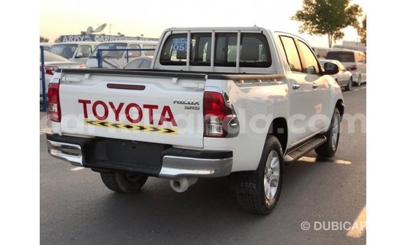 Buy Import Toyota Hilux White Car in Import - Dubai in Uganda Buy Import Toyota Hilux White Car in Import - Dubai in Uganda
