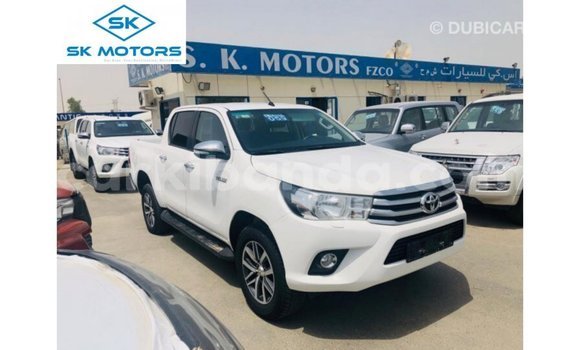 Buy Import Toyota Hilux White Car in Import - Dubai in Uganda Buy Import Toyota Hilux White Car in Import - Dubai in Uganda