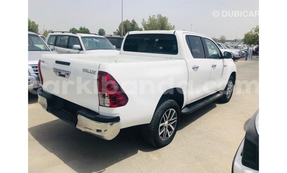 Buy Import Toyota Hilux White Car in Import - Dubai in Uganda Buy Import Toyota Hilux White Car in Import - Dubai in Uganda
