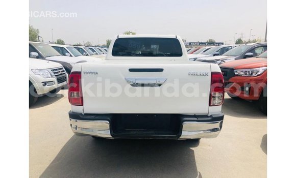 Buy Import Toyota Hilux White Car in Import - Dubai in Uganda Buy Import Toyota Hilux White Car in Import - Dubai in Uganda