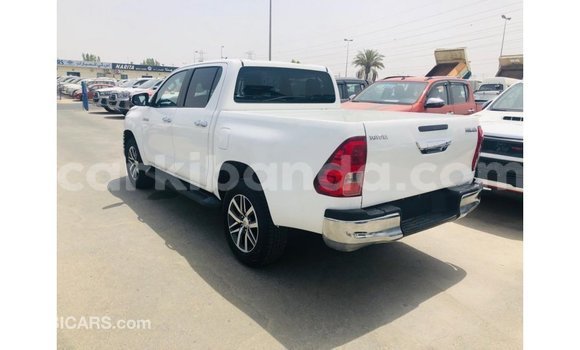 Buy Import Toyota Hilux White Car in Import - Dubai in Uganda Buy Import Toyota Hilux White Car in Import - Dubai in Uganda