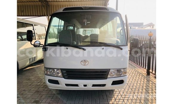 Buy Import Toyota Coaster White Car in Import - Dubai in Uganda Buy Import Toyota Coaster White Car in Import - Dubai in Uganda