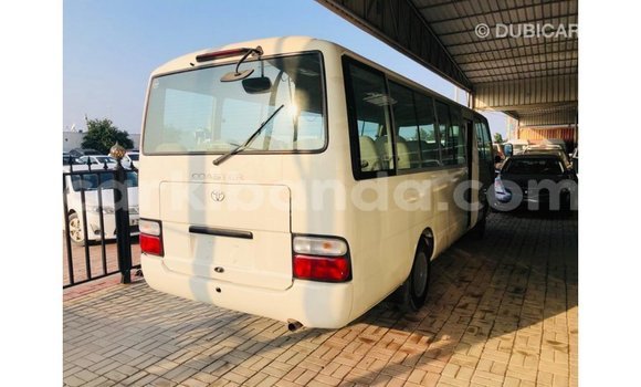 Buy Import Toyota Coaster White Car in Import - Dubai in Uganda Buy Import Toyota Coaster White Car in Import - Dubai in Uganda