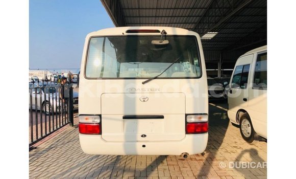 Buy Import Toyota Coaster White Car in Import - Dubai in Uganda Buy Import Toyota Coaster White Car in Import - Dubai in Uganda
