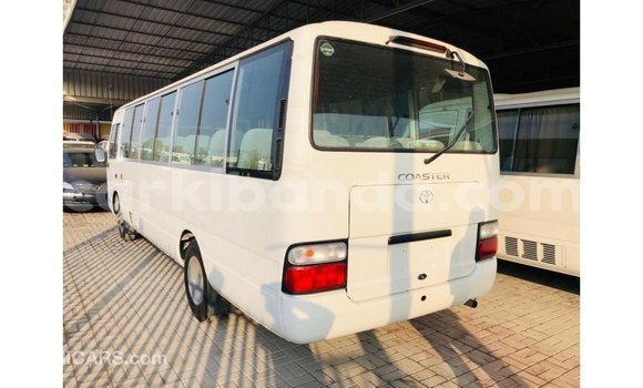 Buy Import Toyota Coaster White Car in Import - Dubai in Uganda Buy Import Toyota Coaster White Car in Import - Dubai in Uganda