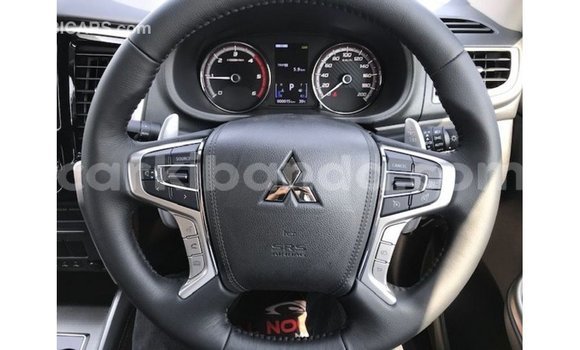 Gura Imported Mitsubishi i Blue Imodoka i Import - Dubai mu Uganda Gura Imported Mitsubishi i Blue Imodoka i Import - Dubai mu Uganda