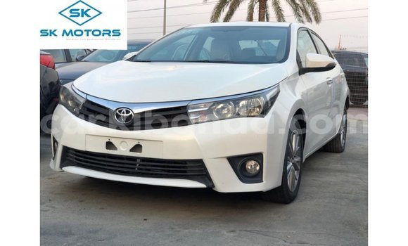 Buy Import Toyota Corolla White Car in Import - Dubai in Uganda Buy Import Toyota Corolla White Car in Import - Dubai in Uganda