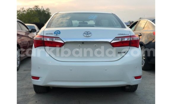 Buy Import Toyota Corolla White Car in Import - Dubai in Uganda Buy Import Toyota Corolla White Car in Import - Dubai in Uganda