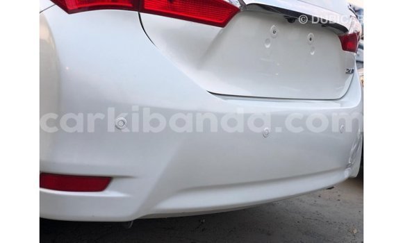 Buy Import Toyota Corolla White Car in Import - Dubai in Uganda Buy Import Toyota Corolla White Car in Import - Dubai in Uganda