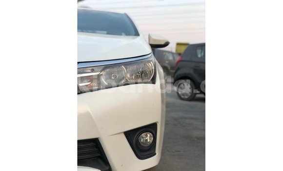 Buy Import Toyota Corolla White Car in Import - Dubai in Uganda Buy Import Toyota Corolla White Car in Import - Dubai in Uganda