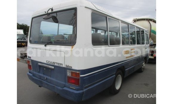 Acheter Import Voiture Toyota Coaster Blanc à Import - Dubai, Ouganda Acheter Import Voiture Toyota Coaster Blanc à Import - Dubai, Ouganda