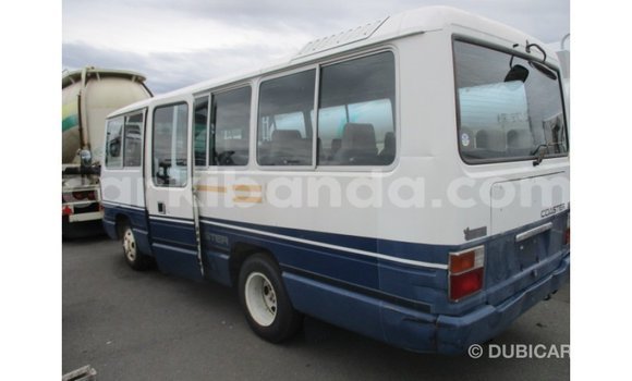Acheter Import Voiture Toyota Coaster Blanc à Import - Dubai, Ouganda Acheter Import Voiture Toyota Coaster Blanc à Import - Dubai, Ouganda