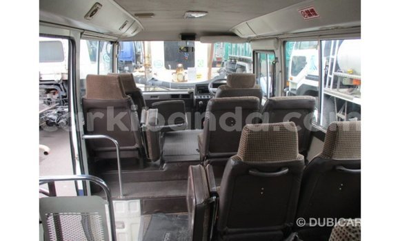 Acheter Import Voiture Toyota Coaster Blanc à Import - Dubai, Ouganda Acheter Import Voiture Toyota Coaster Blanc à Import - Dubai, Ouganda