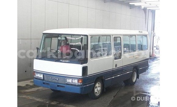 Acheter Import Voiture Toyota Coaster Blanc à Import - Dubai, Ouganda Acheter Import Voiture Toyota Coaster Blanc à Import - Dubai, Ouganda