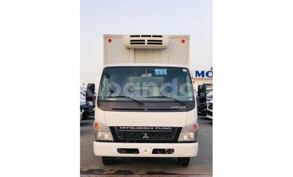 Buy Import Mitsubishi Carisma White Car in Import - Dubai in Uganda Buy Import Mitsubishi Carisma White Car in Import - Dubai in Uganda