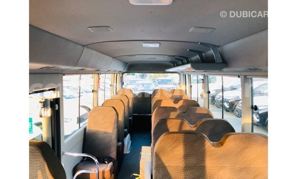 Buy Import Toyota Coaster White Car in Import - Dubai in Uganda Buy Import Toyota Coaster White Car in Import - Dubai in Uganda