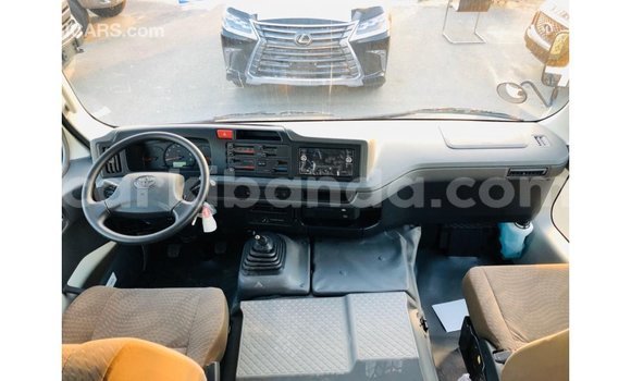 Buy Import Toyota Coaster White Car in Import - Dubai in Uganda Buy Import Toyota Coaster White Car in Import - Dubai in Uganda
