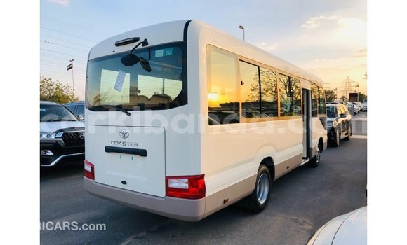 Buy Import Toyota Coaster White Car in Import - Dubai in Uganda Buy Import Toyota Coaster White Car in Import - Dubai in Uganda
