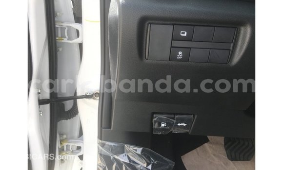 Acheter Import Voiture Nissan Sunny Blanc à Import - Dubai, Ouganda Acheter Import Voiture Nissan Sunny Blanc à Import - Dubai, Ouganda