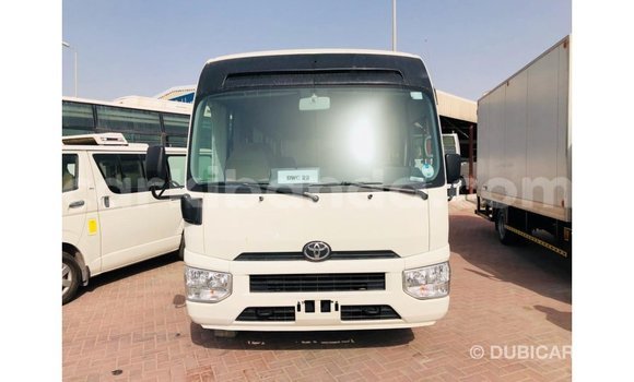 Buy Import Toyota Coaster White Car in Import - Dubai in Uganda Buy Import Toyota Coaster White Car in Import - Dubai in Uganda