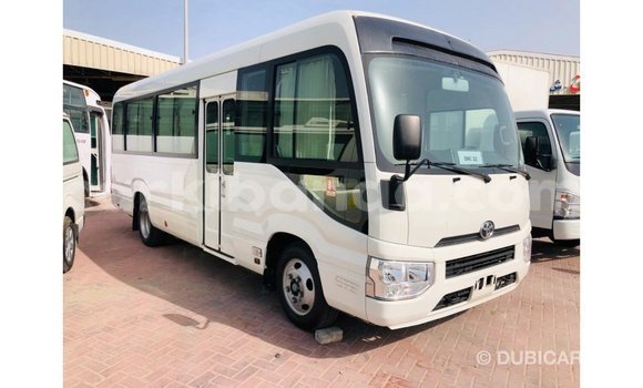 Buy Import Toyota Coaster White Car in Import - Dubai in Uganda Buy Import Toyota Coaster White Car in Import - Dubai in Uganda