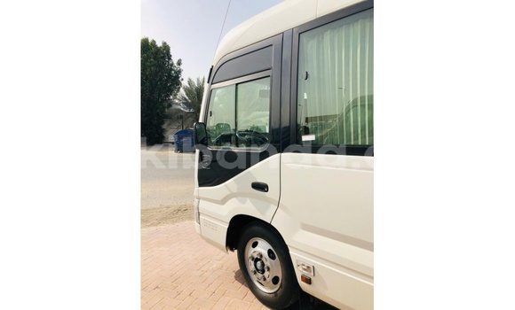 Buy Import Toyota Coaster White Car in Import - Dubai in Uganda Buy Import Toyota Coaster White Car in Import - Dubai in Uganda