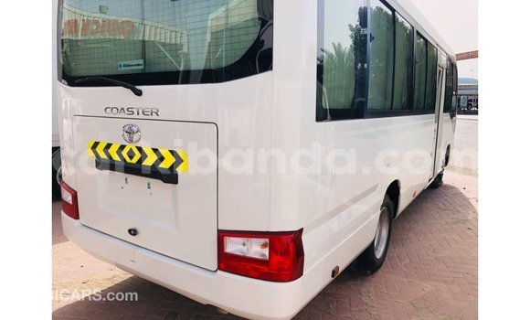 Buy Import Toyota Coaster White Car in Import - Dubai in Uganda Buy Import Toyota Coaster White Car in Import - Dubai in Uganda