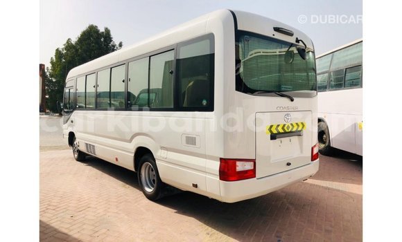 Buy Import Toyota Coaster White Car in Import - Dubai in Uganda Buy Import Toyota Coaster White Car in Import - Dubai in Uganda