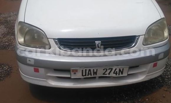 Gura Yakoze Toyota Raum White Imodoka i Kampala mu Uganda Gura Yakoze Toyota Raum White Imodoka i Kampala mu Uganda