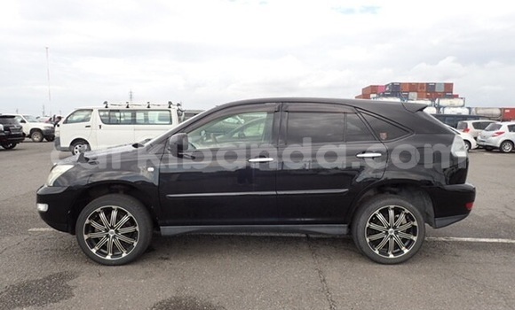 Gura Yakoze Toyota Harrier Black Imodoka i Kampala mu Uganda