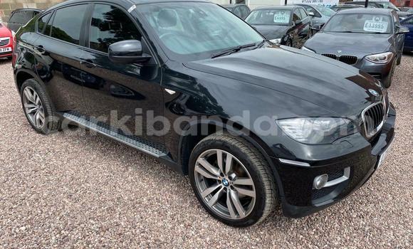 Gura Yakoze BMW X6 M Black Imodoka i Kampala mu Uganda Gura Yakoze BMW X6 M Black Imodoka i Kampala mu Uganda