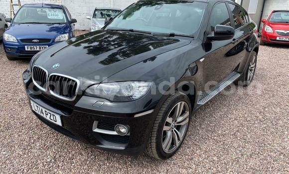 Gura Yakoze BMW X6 M Black Imodoka i Kampala mu Uganda Gura Yakoze BMW X6 M Black Imodoka i Kampala mu Uganda