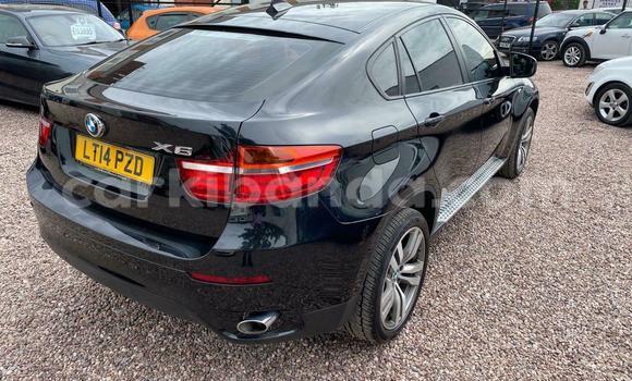 Gura Yakoze BMW X6 M Black Imodoka i Kampala mu Uganda Gura Yakoze BMW X6 M Black Imodoka i Kampala mu Uganda