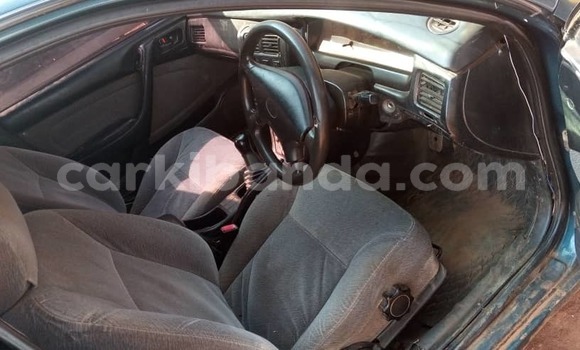 Gura Yakoze Toyota Corona Green Imodoka i Mpigi mu Central Gura Yakoze Toyota Corona Green Imodoka i Mpigi mu Central