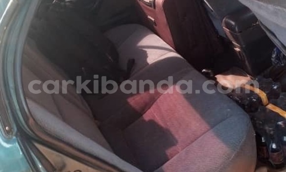 Gura Yakoze Toyota Corona Green Imodoka i Mpigi mu Central Gura Yakoze Toyota Corona Green Imodoka i Mpigi mu Central