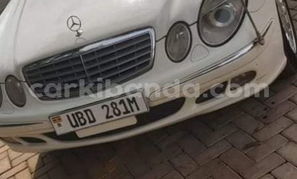 Gura Yakoze Mercedes‒Benz E–Class White Imodoka i Kampala mu Uganda Gura Yakoze Mercedes‒Benz E–Class White Imodoka i Kampala mu Uganda