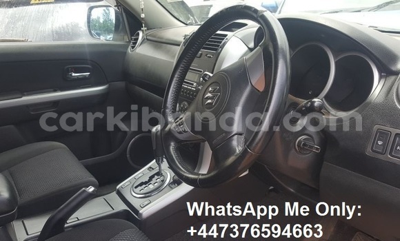 Gura Yakoze Suzuki Escudo White Imodoka i Kampala mu Uganda Gura Yakoze Suzuki Escudo White Imodoka i Kampala mu Uganda