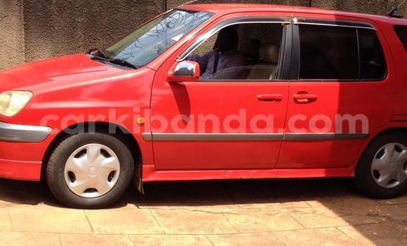 Buy Used Toyota Raum Red Car in Kampala in Uganda