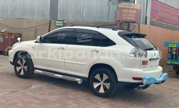 Gura Yakoze Toyota Harrier White Imodoka i Kampala mu Uganda