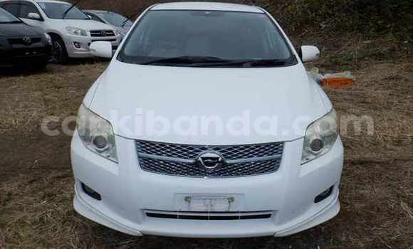Buy Import Toyota Corolla White Car in Kampala in Uganda