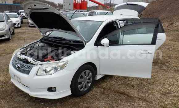 Buy Import Toyota Corolla White Car in Kampala in Uganda Buy Import Toyota Corolla White Car in Kampala in Uganda