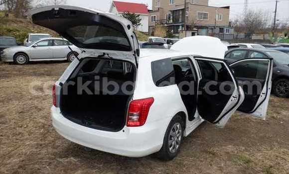 Buy Import Toyota Corolla White Car in Kampala in Uganda Buy Import Toyota Corolla White Car in Kampala in Uganda